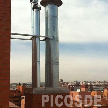 Chimeneas Picos de Europa - Caperuzas chimeneas edificios