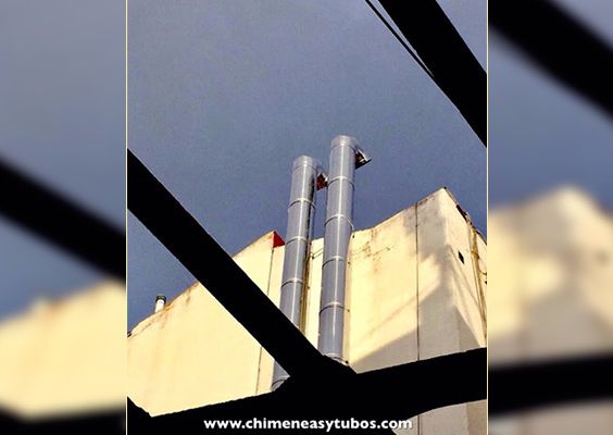 Chimeneas Picos de Europa - Tubos de local por patio de edificio en Madrid
